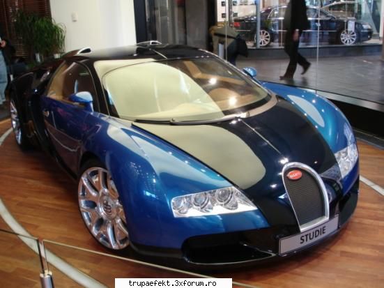 cosmin cunosc amsina aia care esti langa mai sus.cateva poze.este porsche portocaliu este lui asta